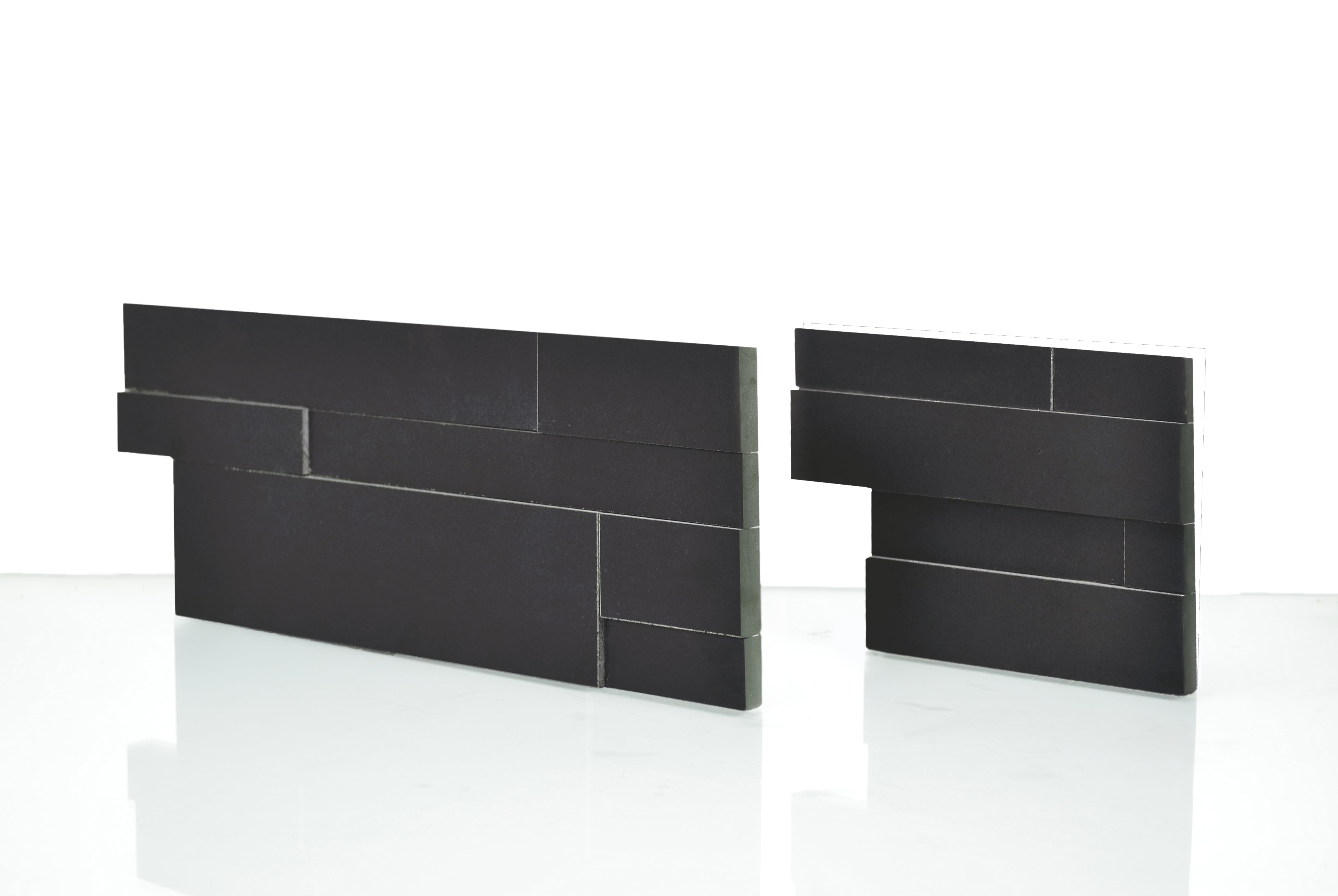 Studio Shot of a Natural End Panel of the Norstone Aksent 3D Series Stone Veneer Panel in Ebony Basalt